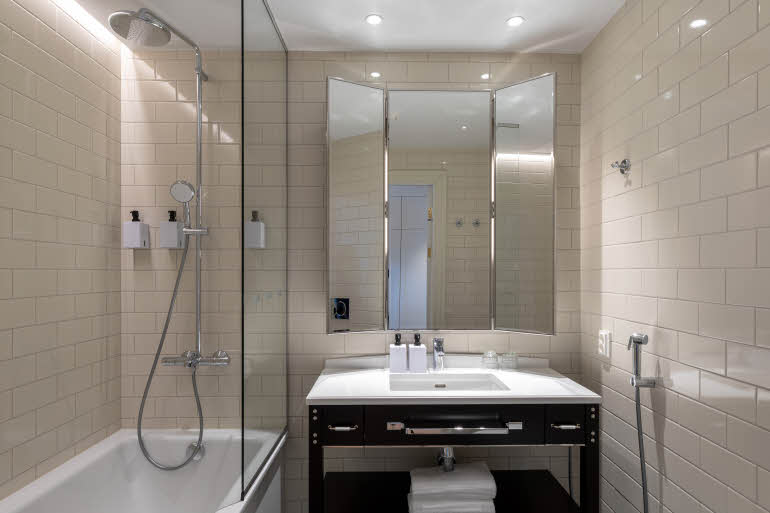 Bathroom with bathtub at Scandic Grand Central Helsinki