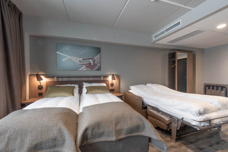 bed and sofabed in family room at scandic sortland