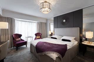 room superior king size bed at grand hotel oslo in norway