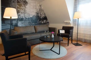Sofa and chairs in Standard Family Four room at Scandic Sundsvall City