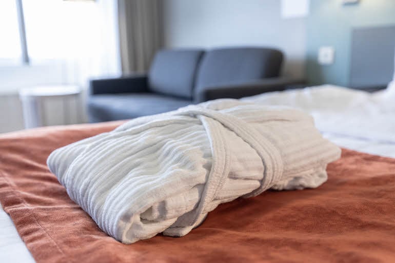 bathrobe in room superior at scandic rosendahl in tampere finland