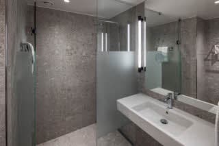 standard bathroom at scandic cph strandpark in copenhagen denmark