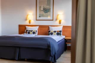bed in junior suite at scandic arhus vest