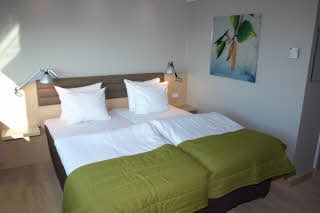 bed in standard twin room at Scandic Olympic in Esbjergstandard room