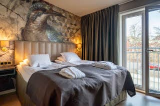 bed in superior room at scandic arvika