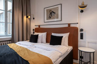 bed in superior family room at scandic grand central helsinki