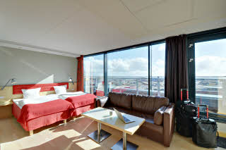 Junior Suite bed and sofa at Scandic Olympic in Esbjerg