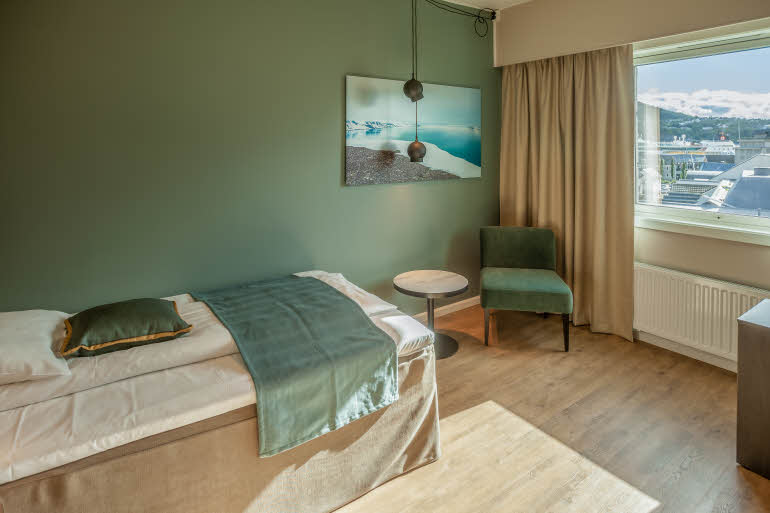 bed in single room at scandic harstad