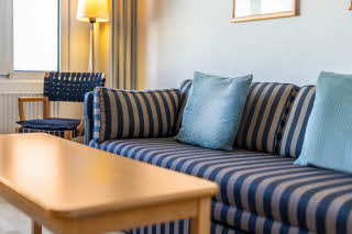 sofa in junior suite at scandic arhus vest