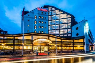 Facade by night hotel Scandic Skelleftea