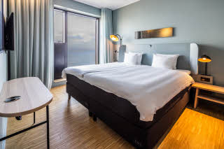 beds in master suite at cph strandpark in copenhagen